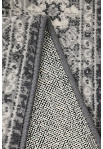 Machine woven rug designed for easy maintenance.