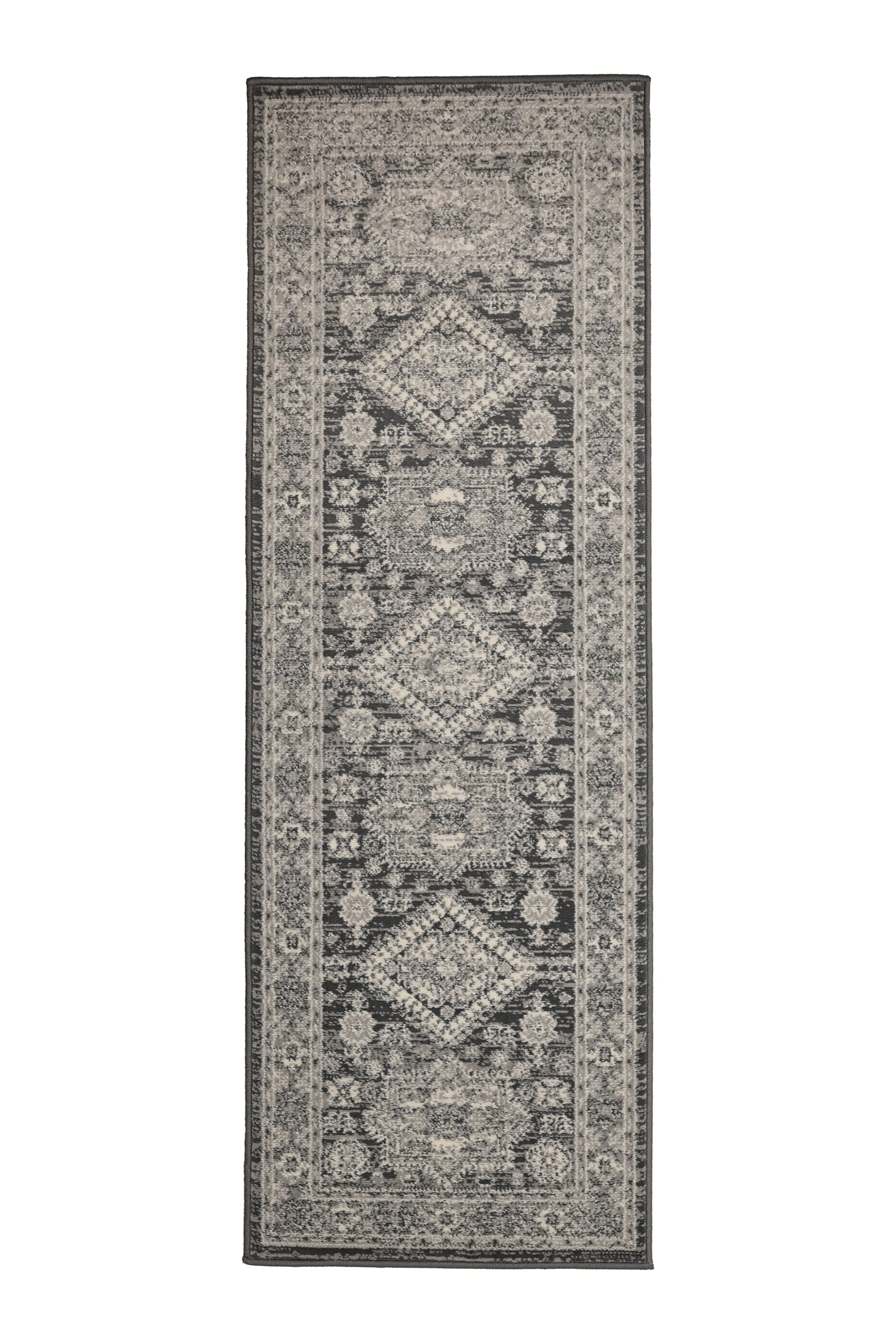 Decorative runner with detailed centre medallion pattern.