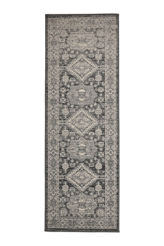Decorative runner with detailed centre medallion pattern.