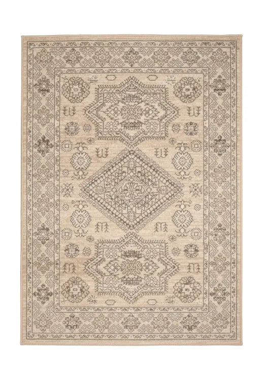 Neutral rug with traditional medallion design in soft tones.