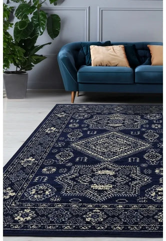 Navy rug with classic medallion pattern design.
