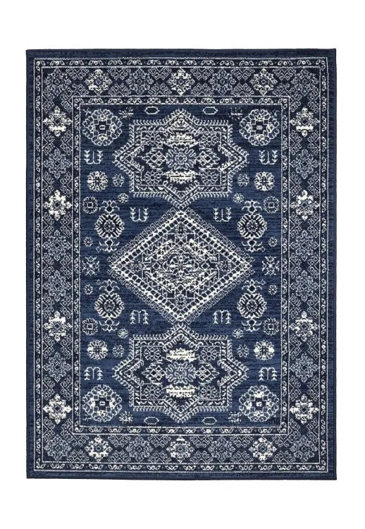 Traditional rug with elegant medallion detailing in deep navy tones.