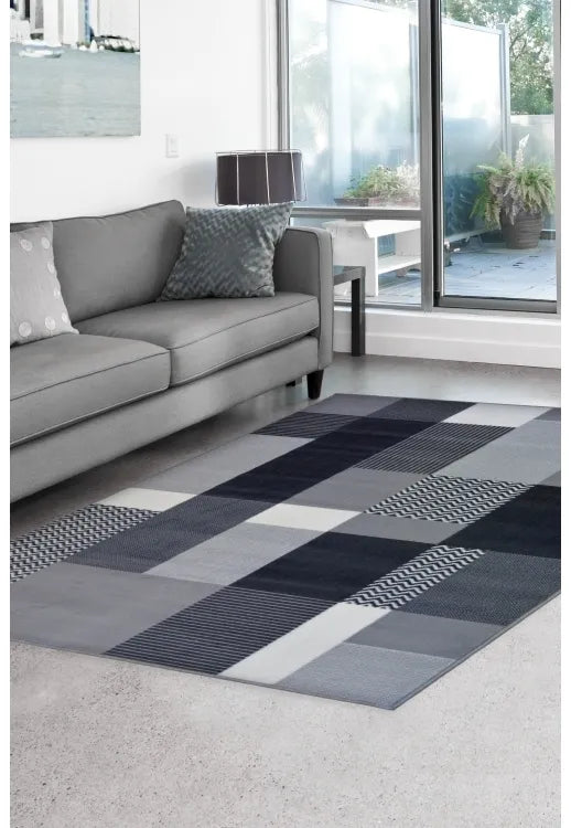 Contemporary grey rug adding elegance and simplicity.