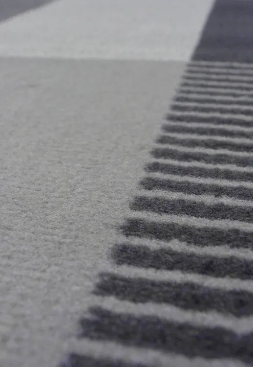 Neutral tone rug with sleek and refined look.