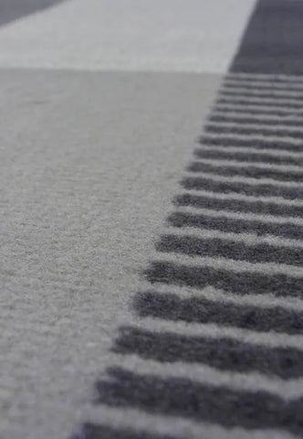 Neutral tone rug with sleek and refined look.