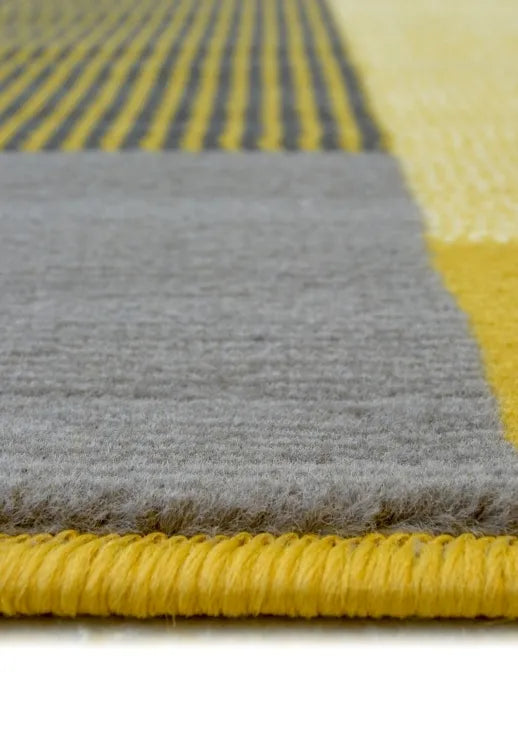 Modern rug in vibrant ochre tones for stylish interiors.