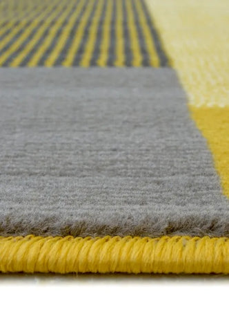 Modern rug in vibrant ochre tones for stylish interiors.