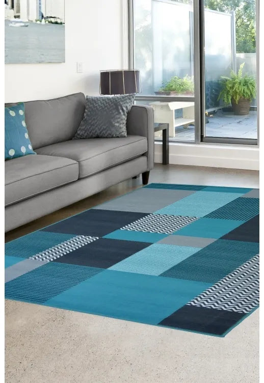 Modern rug in vibrant teal tones for stylish interiors.