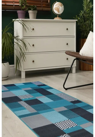Teal runner rug with rich colour and modern design.