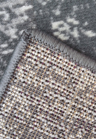 Round traditional rug with easy clean and hardwearing fibres.