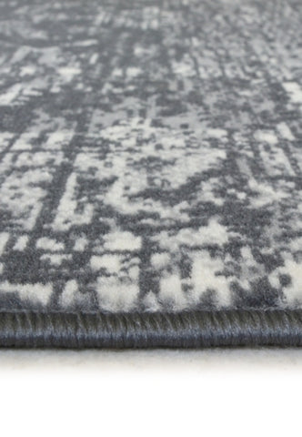 Vintage style round rug with machine woven construction.
