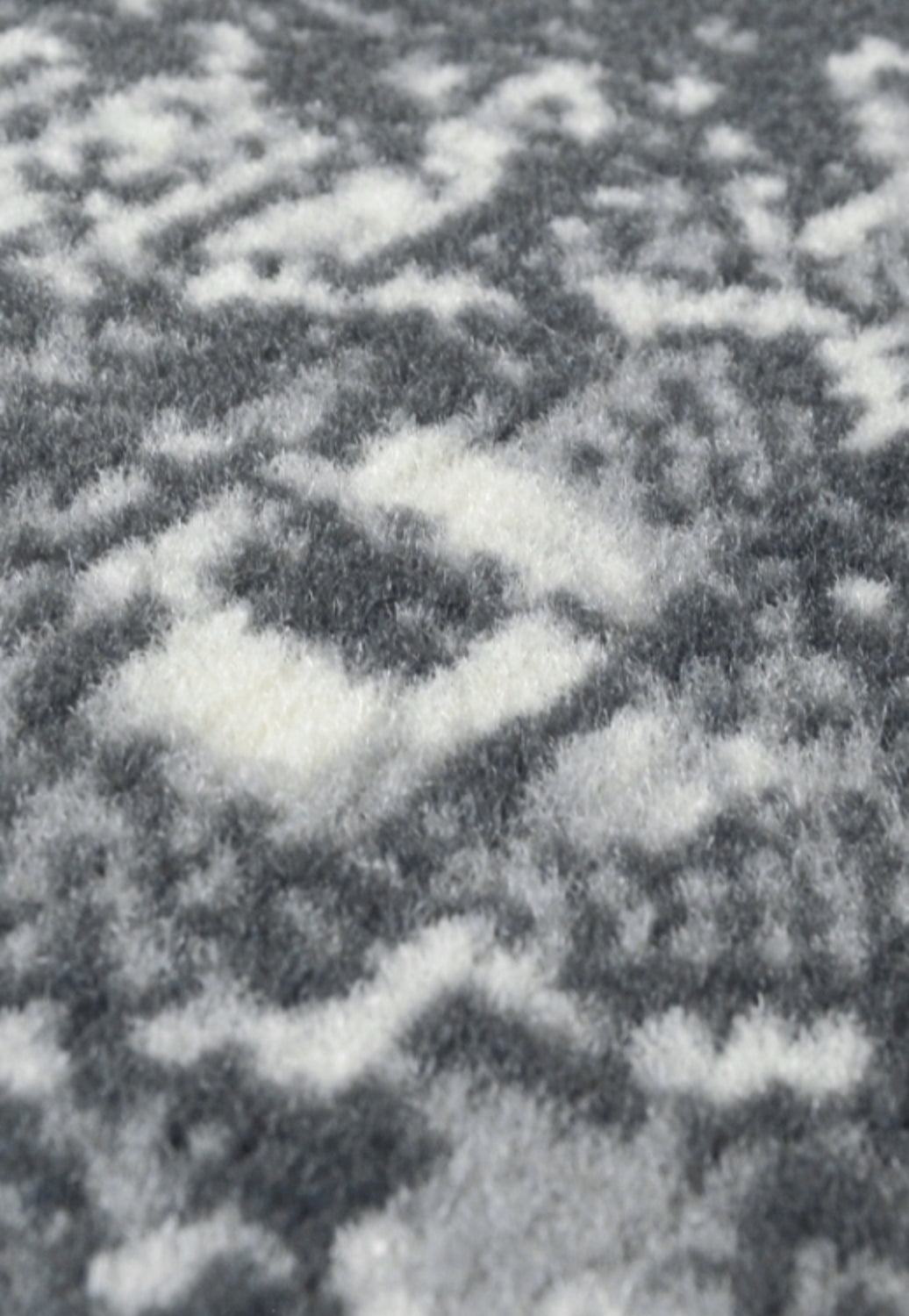 Traditional style rug with easy care material and woven construction.
