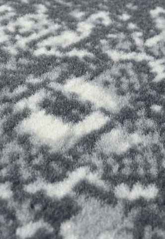 Traditional runner rug with machine woven durable construction.