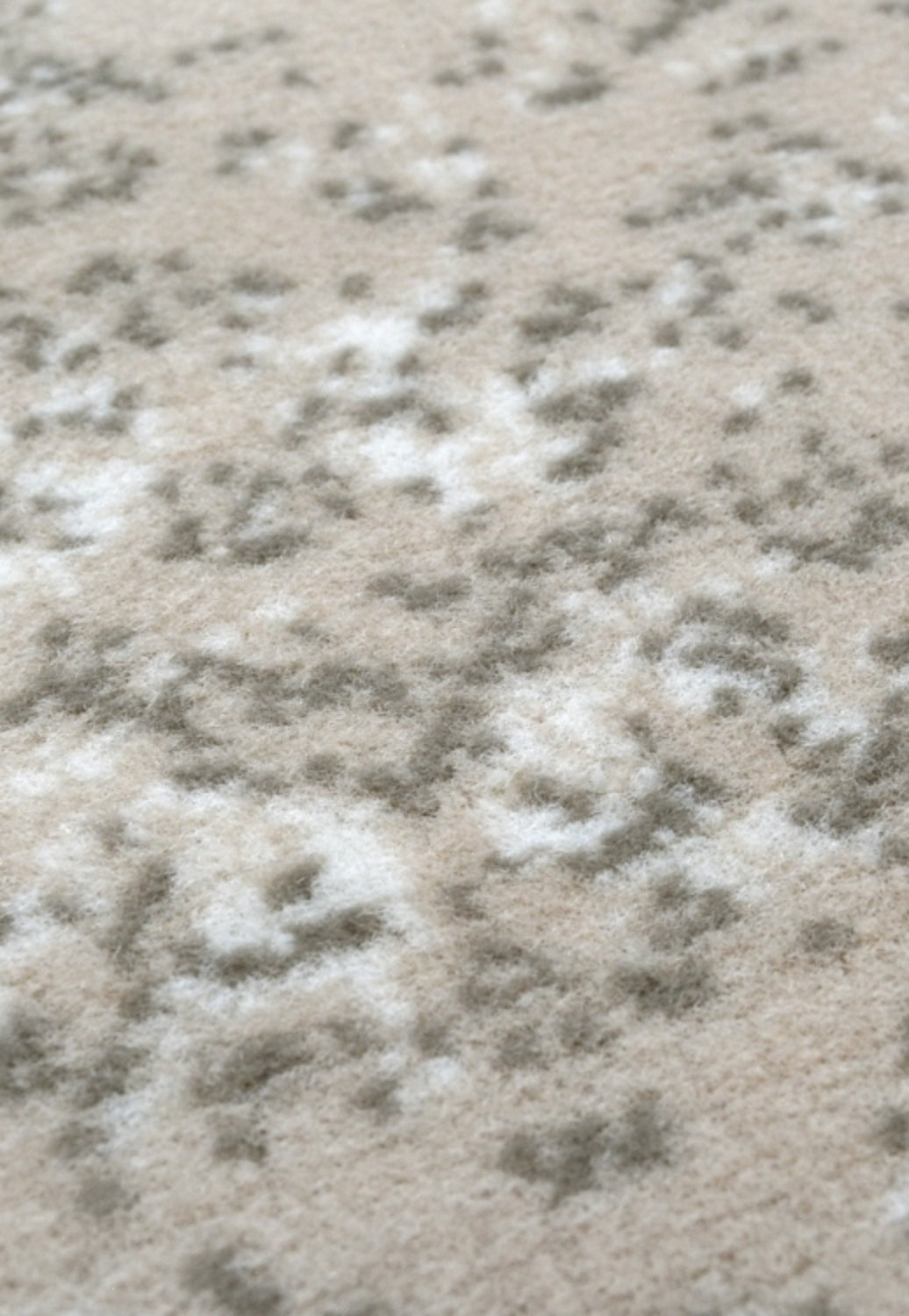 Vintage inspired cream rug with machine woven construction.