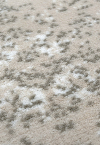 Vintage inspired cream rug with machine woven construction.