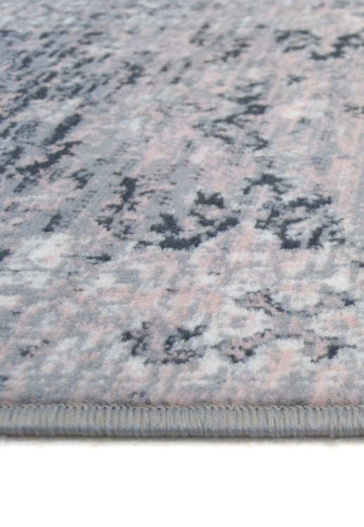 Round traditional style rug with elegant neutral finish.