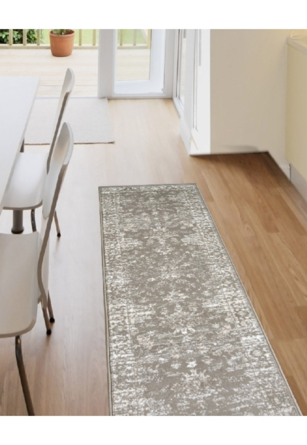 Natural runner rug with traditional inspired pattern.