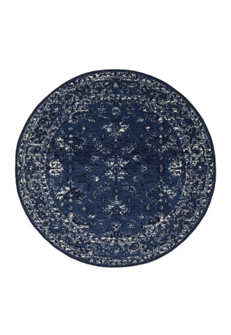 Circular rug with classic design in deep navy tones.