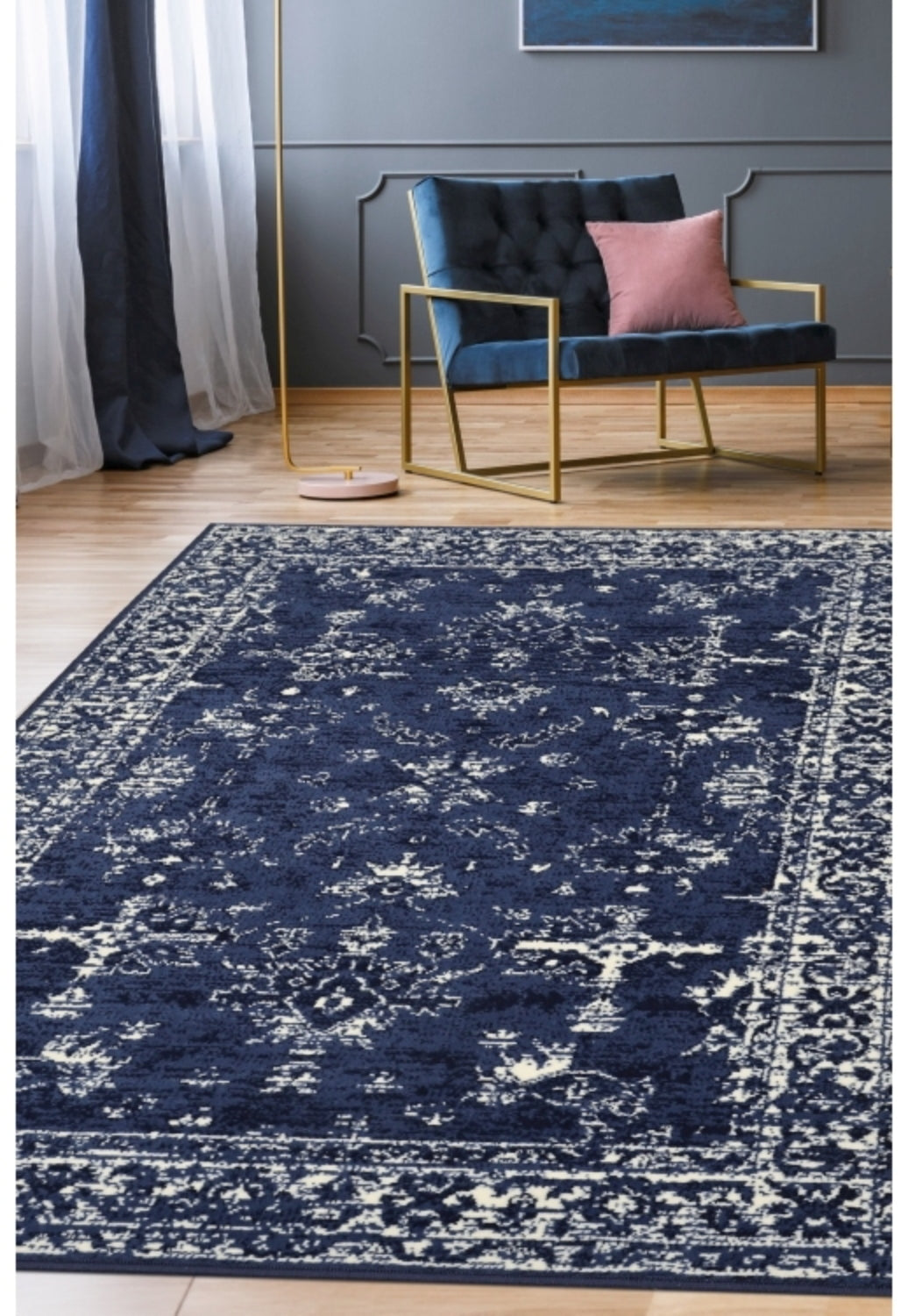 Navy rug with traditional inspired pattern.