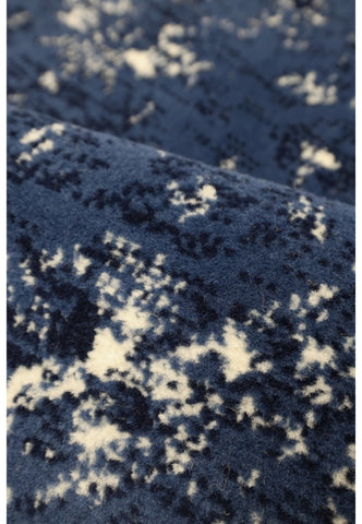 Patterned navy rug for modern and classic interiors.