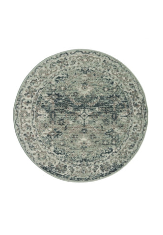 Circular rug with classic design in soft green tones.