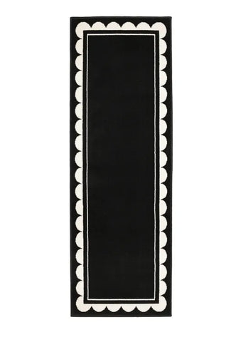 Hallway runner with subtle scallop detailing in black tones.