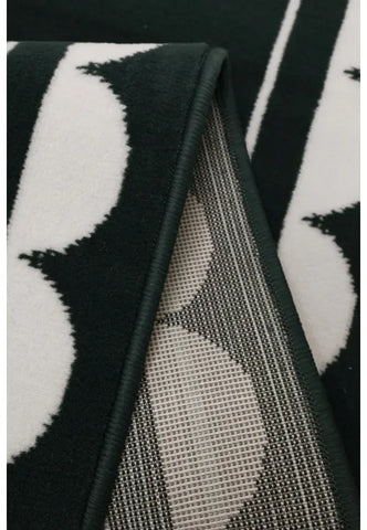 Contemporary runner rug adding texture and contrast.
