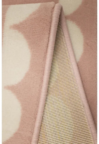Soft tone rug creating a warm and inviting atmosphere.