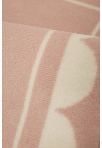Hallway runner with soft scallop detailing in blush tones.
