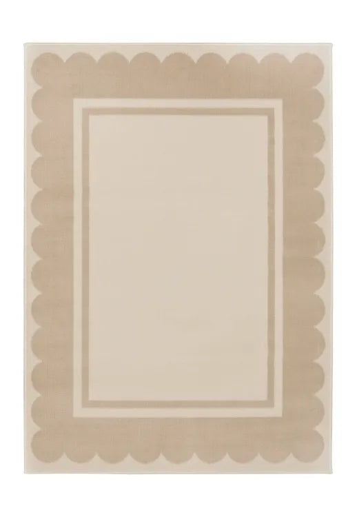 Minimalist rug with soft scallop border and clean design.