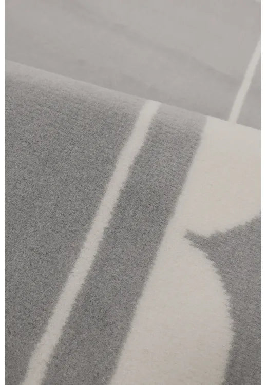 Contemporary runner rug adding texture and sophistication.