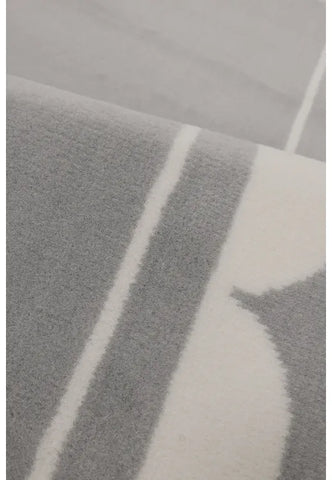 Contemporary runner rug adding texture and sophistication.