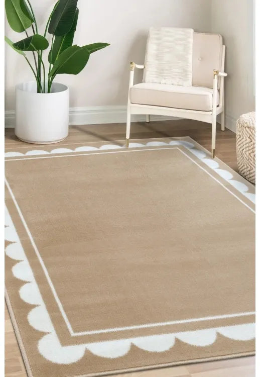 Natural rug with subtle scallop pattern design.