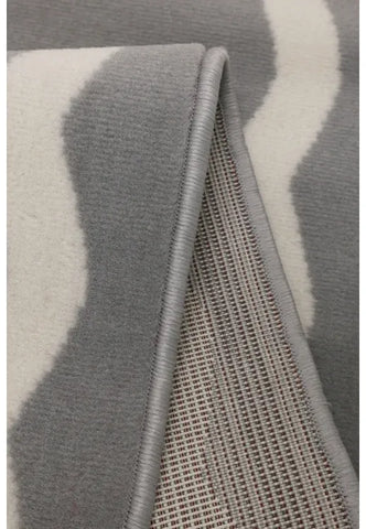 Modern grey rug with refined patterned texture.
