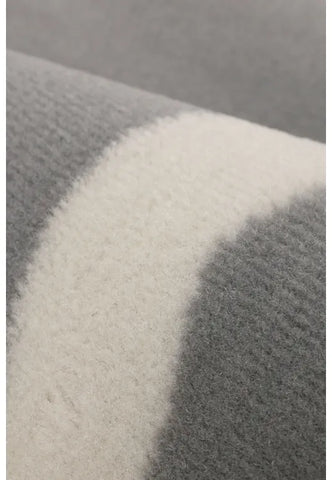 Polypropylene rug with soft pile and durable construction.