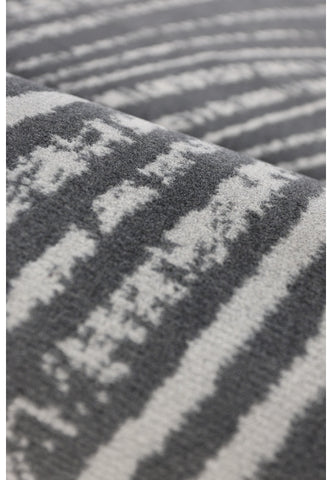 Contemporary rug with textured swirl pattern.
