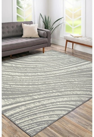 Grey rug with modern swirl pattern design.