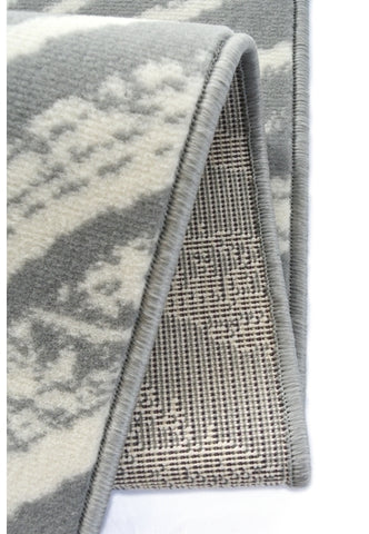 Modern grey rug adding movement and texture.