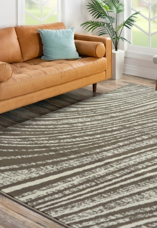 Natural rug with modern swirl pattern design.