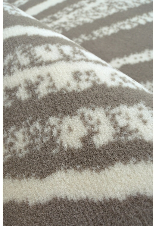 Contemporary rug with subtle swirl detailing.