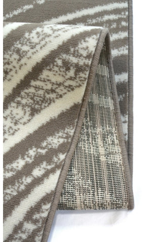 Modern neutral rug adding texture and movement.