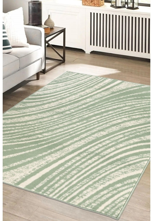 Sage green rug with modern swirl pattern design.