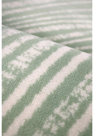 Contemporary rug with subtle swirl detailing.