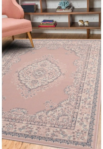 Blush rug with soft elegant modern design.