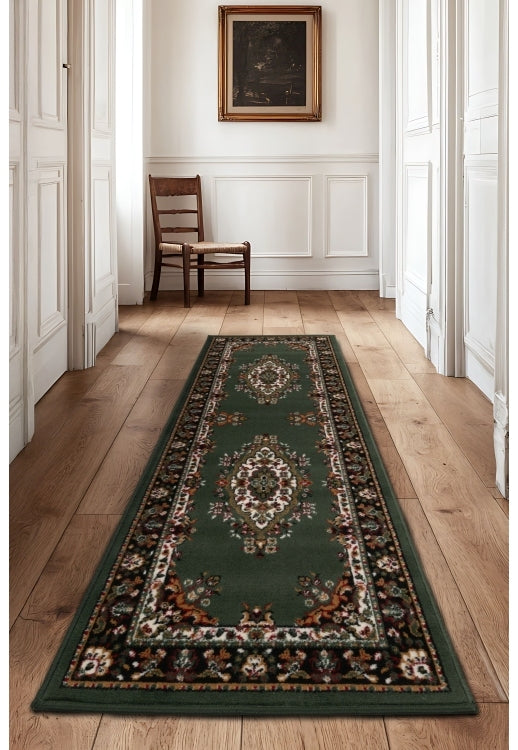 Green runner rug with timeless traditional design.