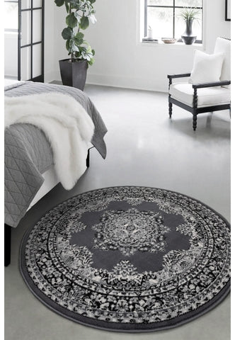 Round grey rug with timeless traditional design.