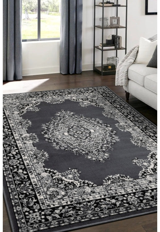 Grey rug with timeless traditional design.