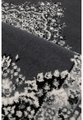 Traditional style rug in versatile grey tones.