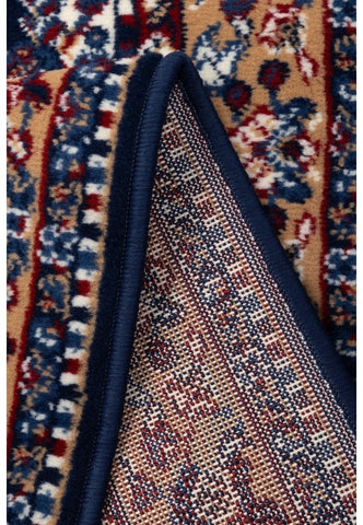 Round navy rug adding depth and sophistication.