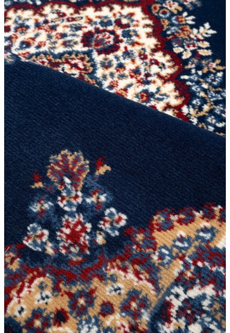 Traditional style rug in rich navy tones.